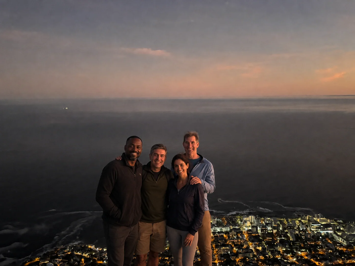 Nicholas with three fictional companions above Cape Town in an edited hilltop photograph